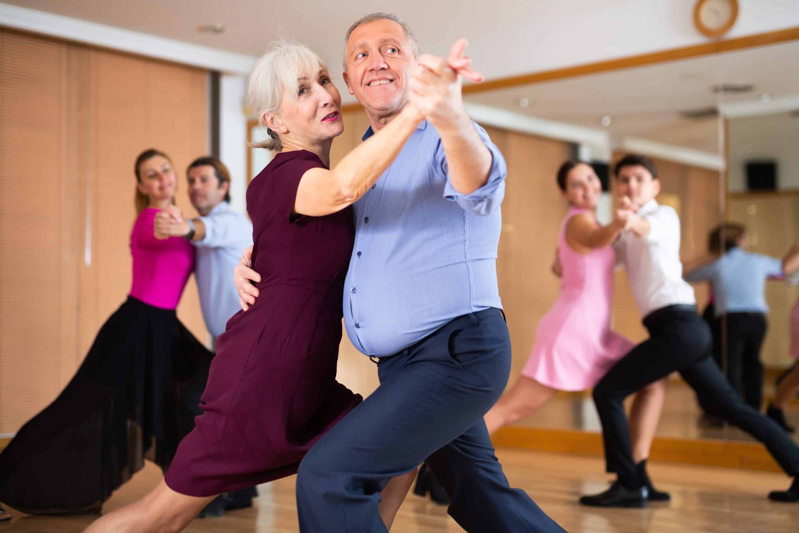 Elder People Dancing with Young People