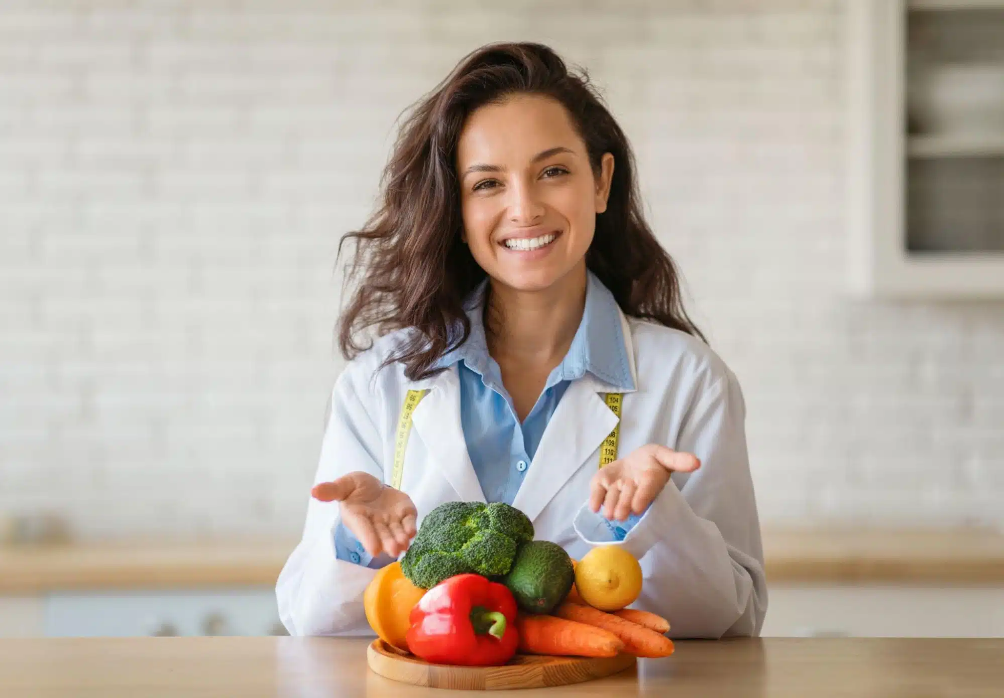 A doctor presenting fruits and vegetables