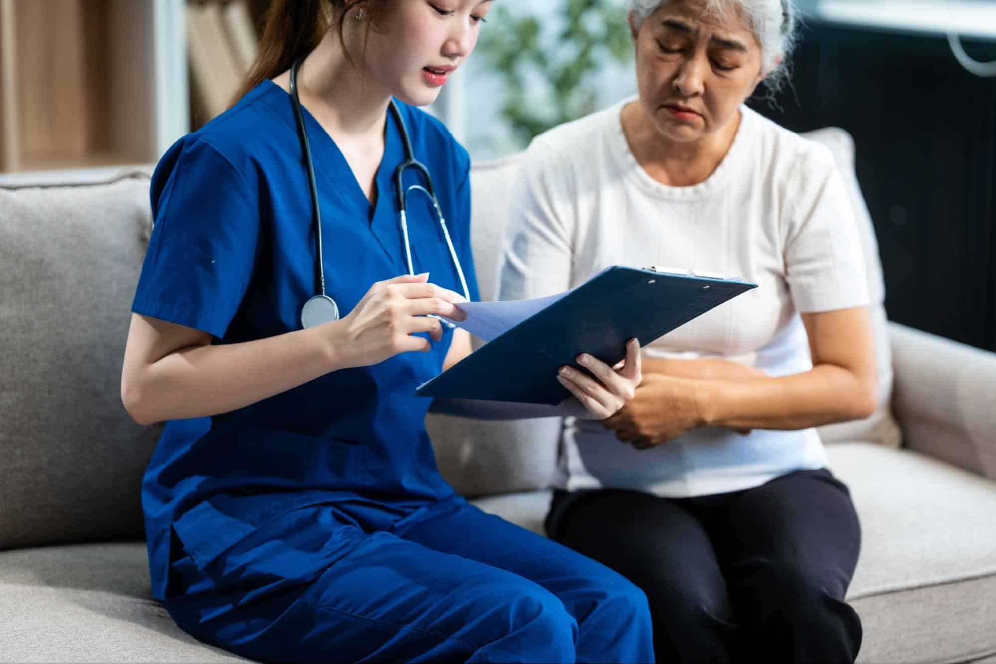 Nurse talking with patient