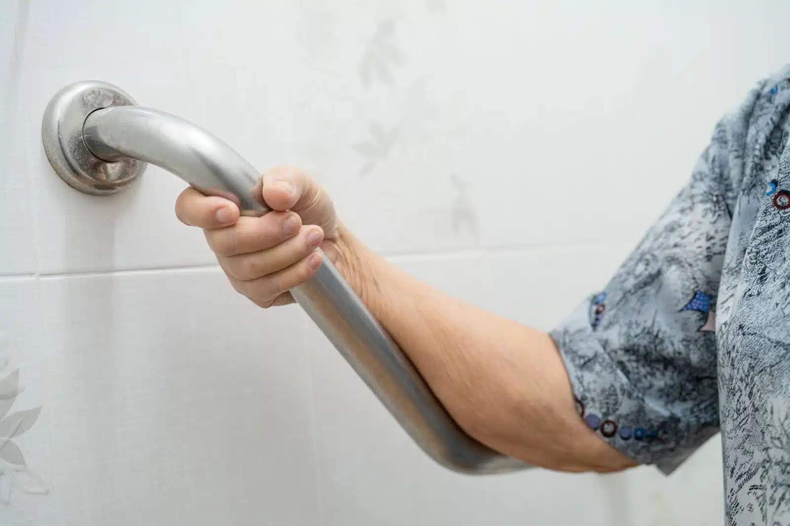 A grab bar in a bathroom to help with aging in place.