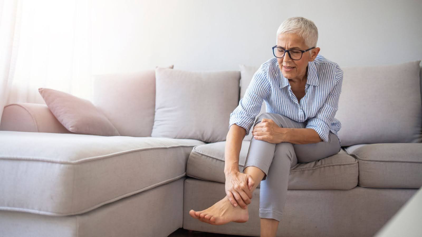 Woman sitting on couch