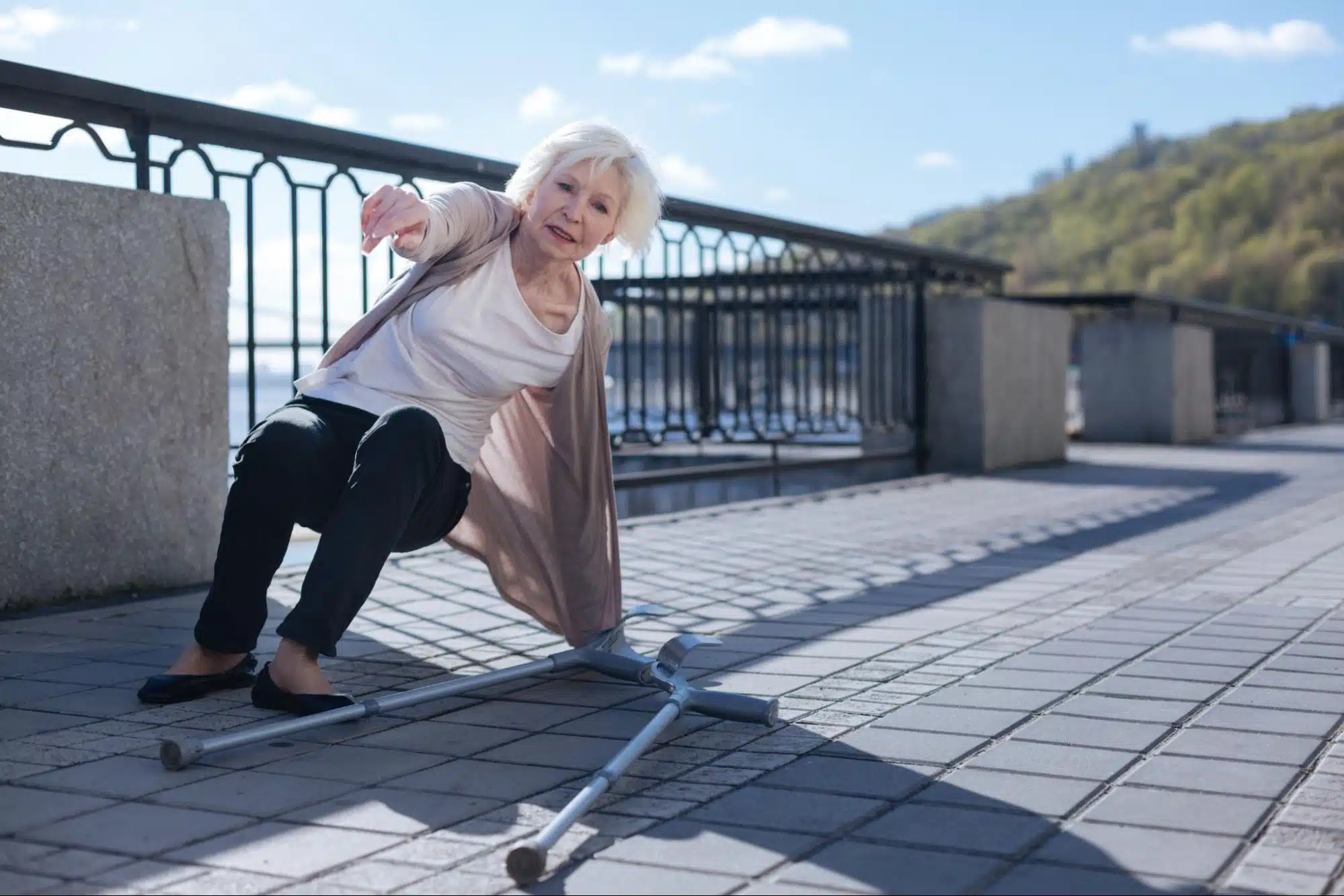 A woman getting up from falling